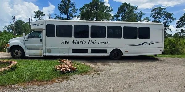 Ave Maria University shuttle bus serviced by Your Automotive Solution providing fleet vehicle repair