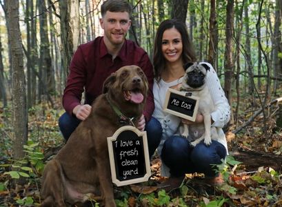 family picture Scott and Katelyn with their dogs Blade and Gus. 