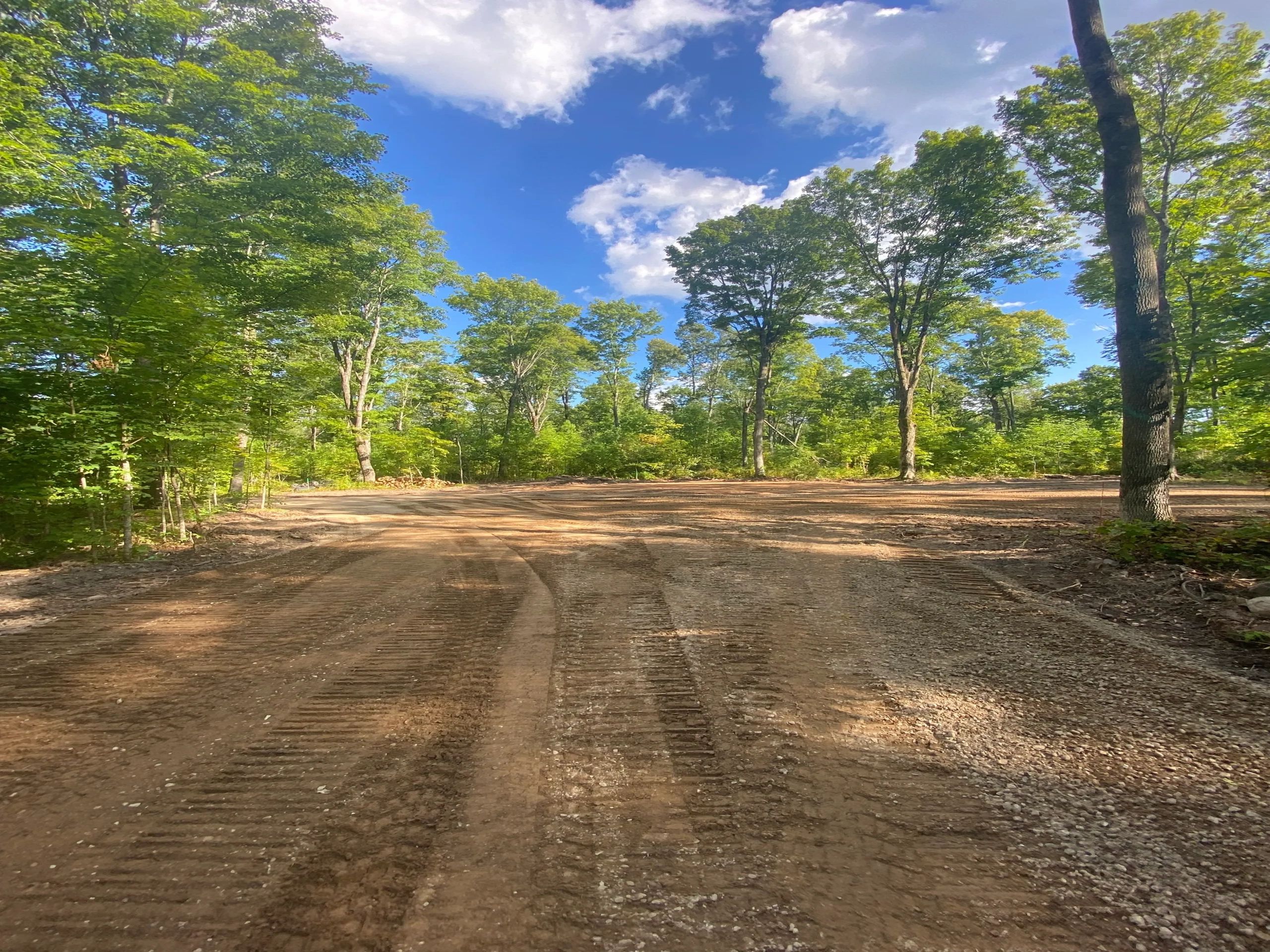 Site prep for new construction in Forest County. Clearing, excavation, grading and foundation prep.