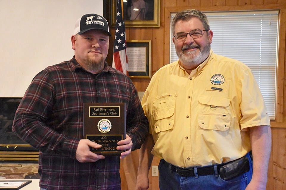 Lifetime Membership Award winner Rich Truesdell, left, and Club President Greg Gerou.