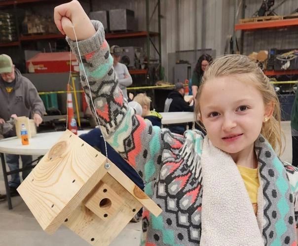 Red River Area Sportsmen's Club Junior Wildlife Club member Koby Nelson holds her wren house at Comstock Construction. Red River Area Sportsmen's Club Junior Wildlife Club member Koby Nelson holds her wren house at Comstock Construction.