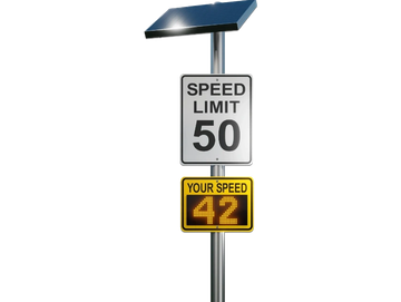 Speed limit sign with a solar-powered speed display showing 42 mph.