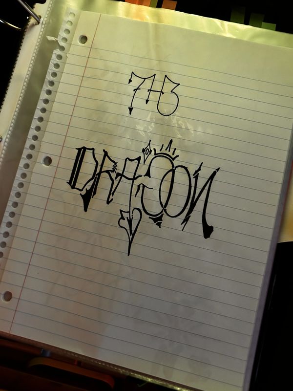 Artistic graffiti-style drawing of the word 'DRAGON' with the number 773 above it.
