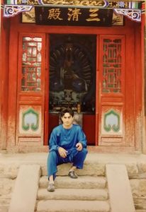 resting - waiting master after training at the temple door 