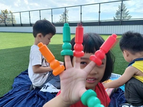 Children playing on our outdoor rooftop area.
