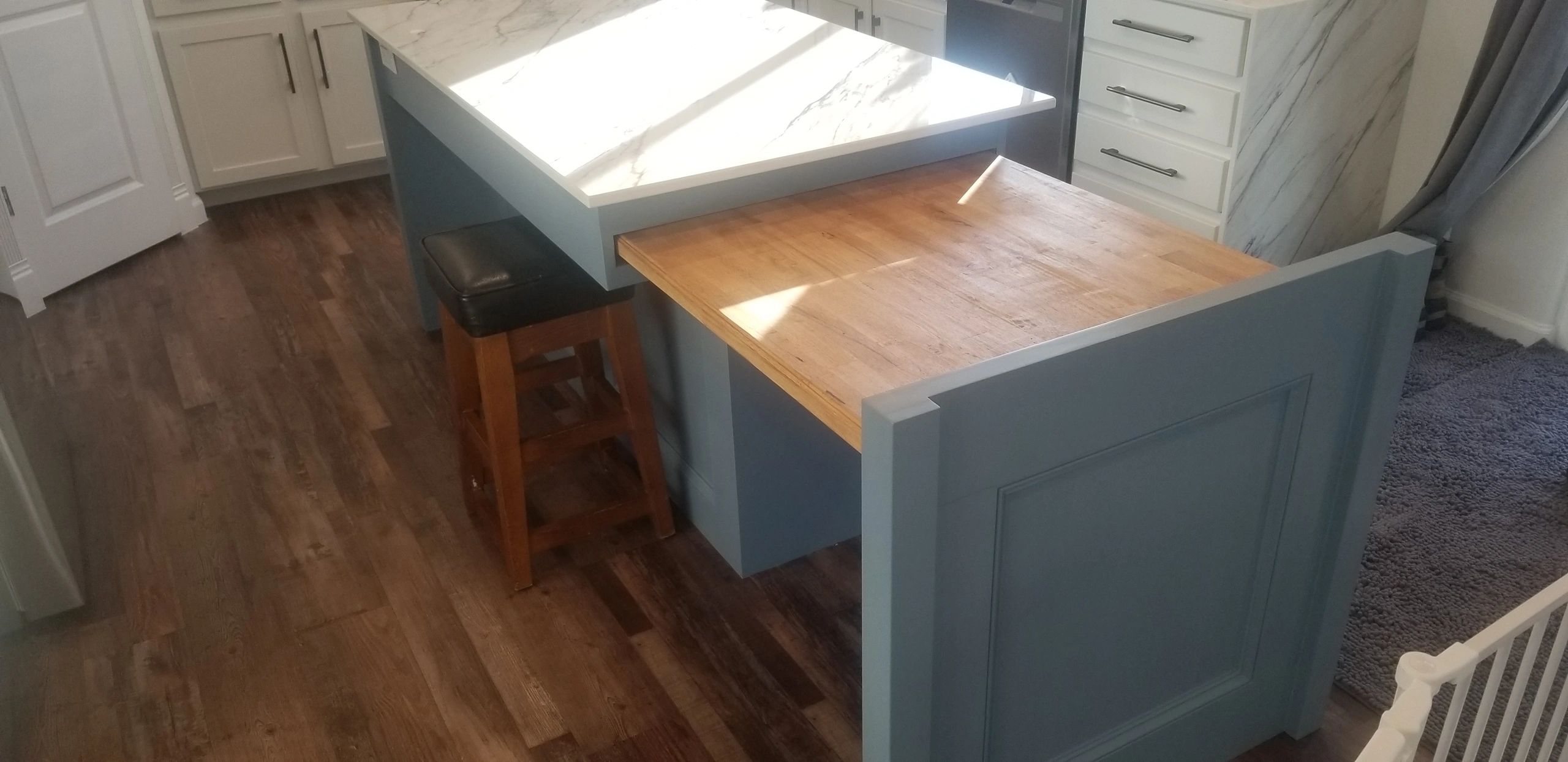 Kitchen Island Cabinet with extendable hidden table. 