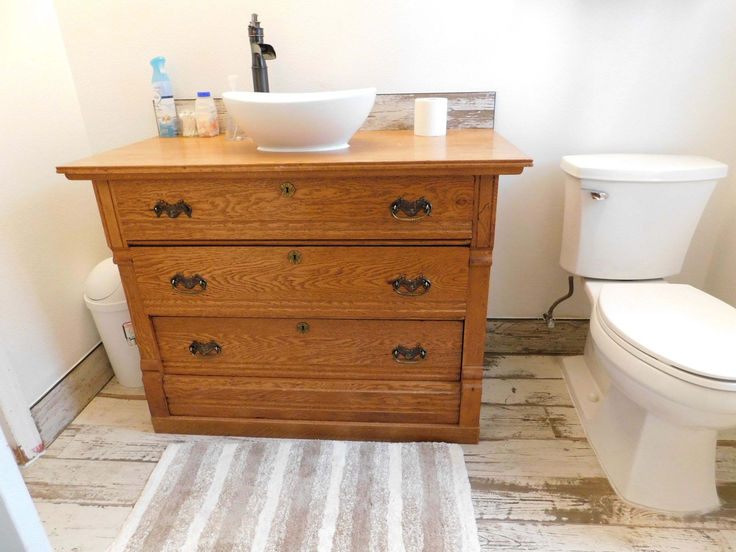 Vintage dresser now a bathroom cabinet.