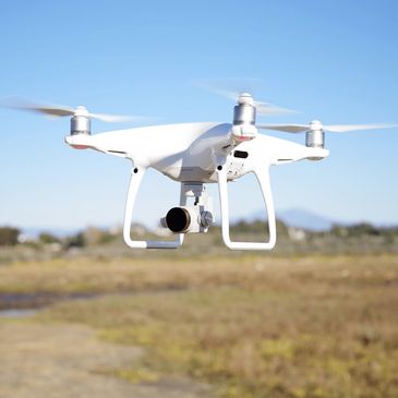 Our primary drone is the Phantom 4 Pro.  It contains a 21 MP camera for vibrant and bright RAW and J