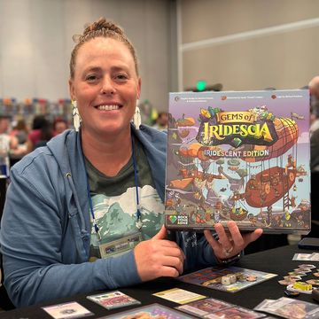 Rachelle scores 93 points at Gems of Iridescia at Dice Tower Retreat 2025.