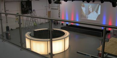 View through glazed stainless steel handrailing from a trade showroom mezzanine floor near Heathrow.