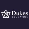 Logo of Dukes Education featuring a stylized crown and book icon.