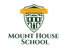 Mount House School logo featuring a shield and banner.