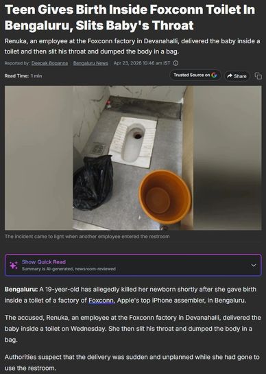 A squat toilet in a factory restroom with a black plastic bag and an orange bucket on the floor.