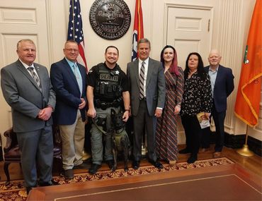 Sanda Ayers and Emory Larson with Governor Bill Lee of Tennessee