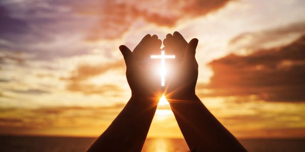 Evening sunshine with man hold the plus icon on the hand