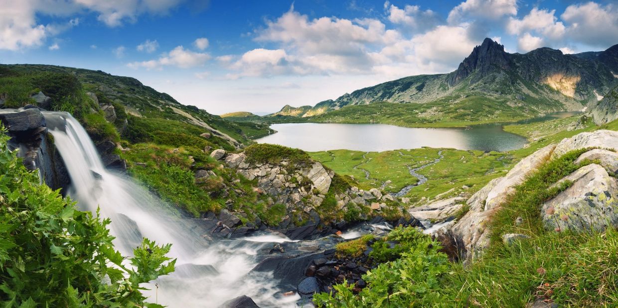 A photo with water park and pound With Mountain