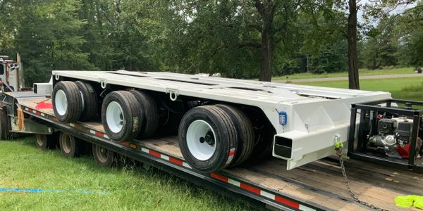L.W. Oney House Moving, Inc - Moving Equipment, Hydraulic Trailers