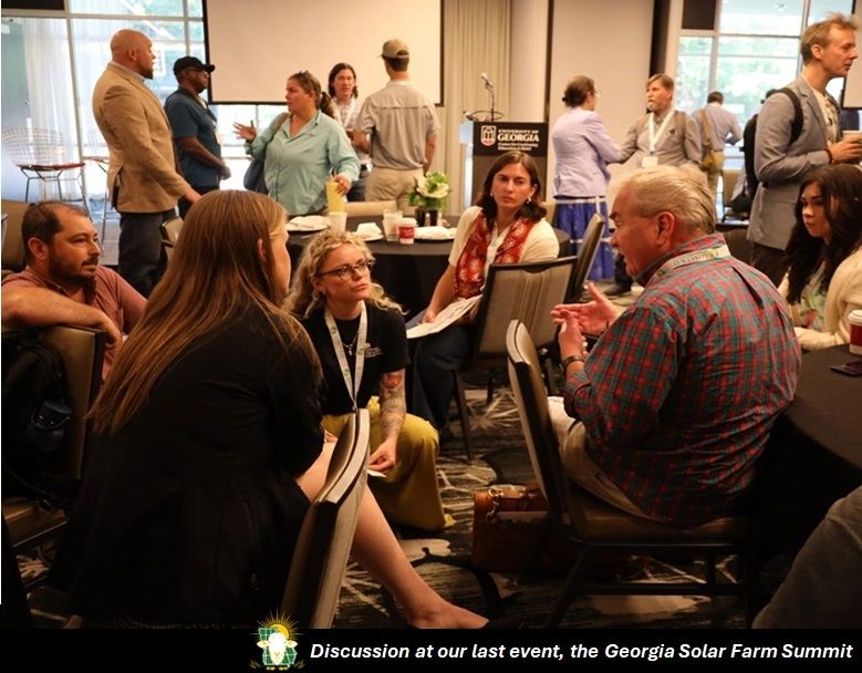 People engaged in discussion at Georgia Solar Farm Summit.