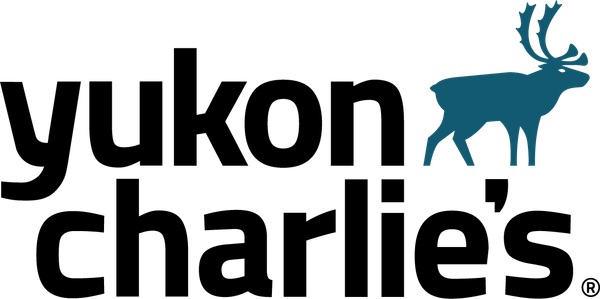 Yukon Charlie's logo with a blue caribou illustration.