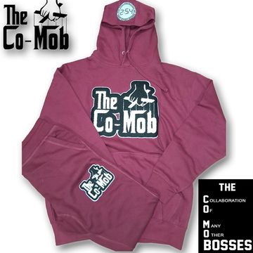 Burgundy hoodie and sweatpants set with The Co-Mob logo and hand puppet graphic.