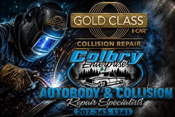 Welder working with sparks for Colbry Enterprises auto body repair.