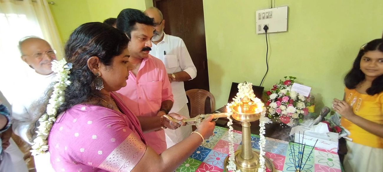 Teacher helping students