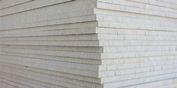 Stack of rectangular marble slabs.