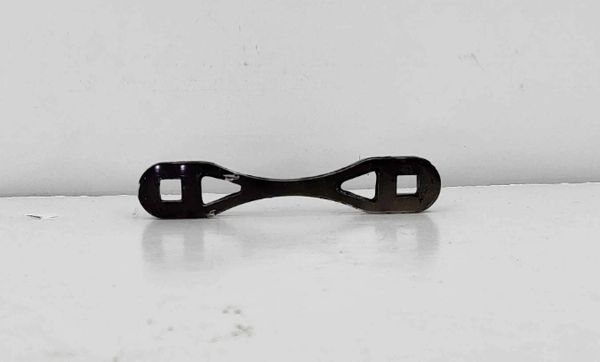 Black plastic strap with square holes on both ends.