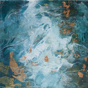 Swirling blues and whites, turbulence inderwater with gold leaf