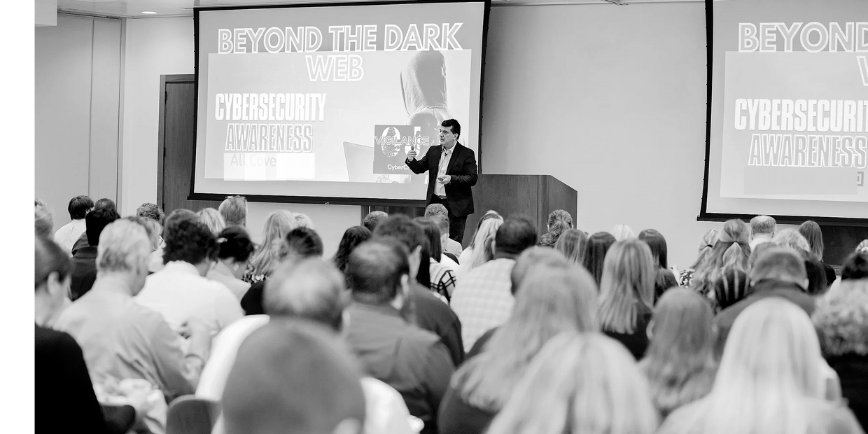 Image of David Mauro, creator of Cyber Crime Junkies Podcast presenting live security awareness.