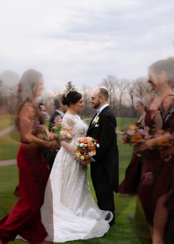Bride and groom facing each other during wedding ceremony.
