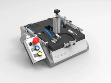 Automated hold down fixture