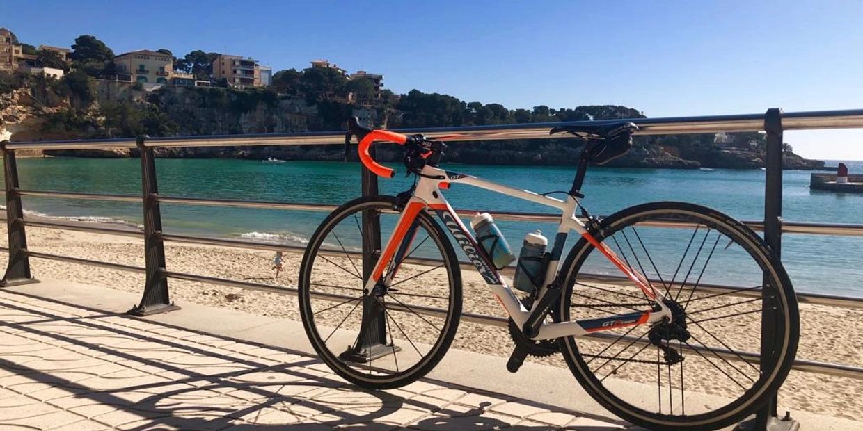 Wilier GTR Team hire bike with Shimano Ultegra Di2 electronic gears in the sun by the sea at Porto C