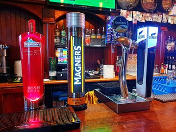 Photo of beer taps on counter
