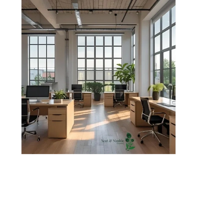 Bright, modern office with natural light, clean desks, plants, and Neat & Nimble branding.