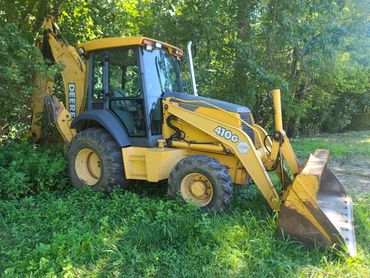 2004 John Deere 410G extendahoe All options including plumbing to the back and front no radio 2900hr