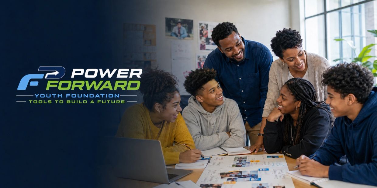 Diverse youth and mentors smiling and collaborating at a table with the Power Forward Youth Foundation logo.
