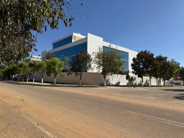 aerospace park modern industrial complex on rent with large buildings and green lawn