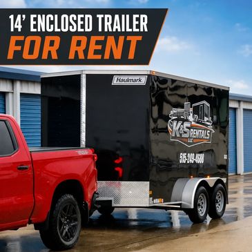 14-foot enclosed trailer for rent hitched to a red pickup truck.