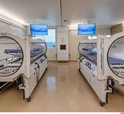 Hyperbaric oxygen therapy chambers in a clinical setting.