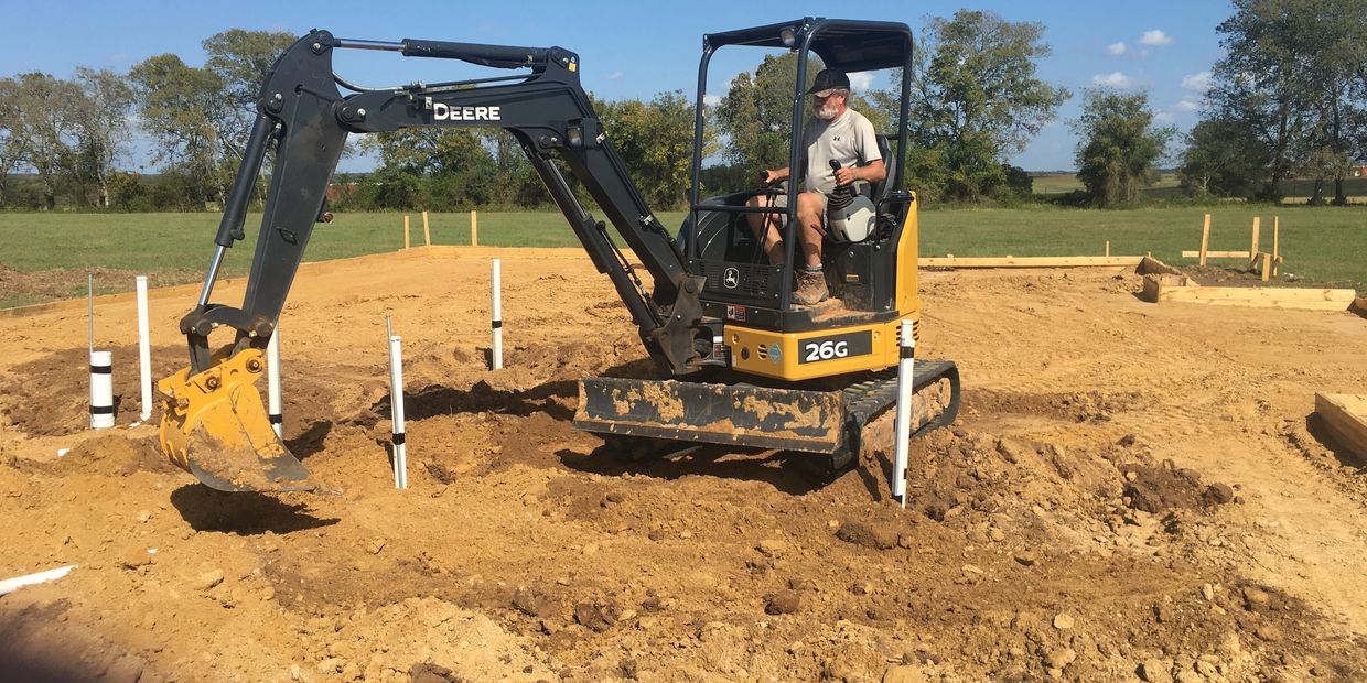 tractor excavating dirt 2