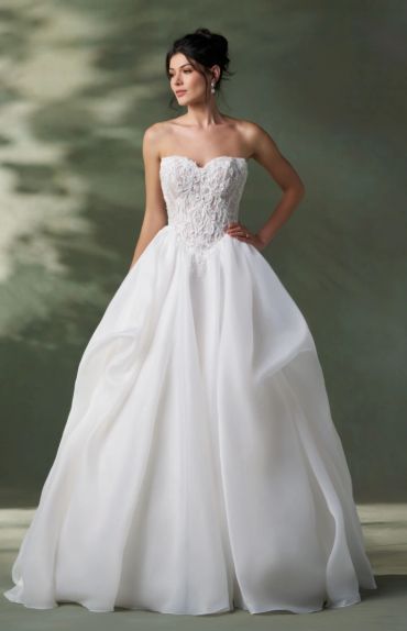 Woman in a strapless white wedding dress.