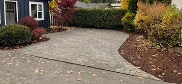Curved paver stone driveway addition