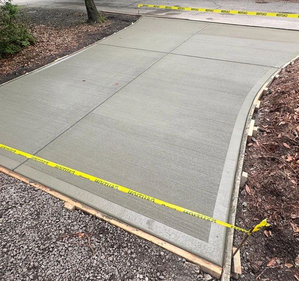 Concrete apron. Freshly poured concrete driveway 