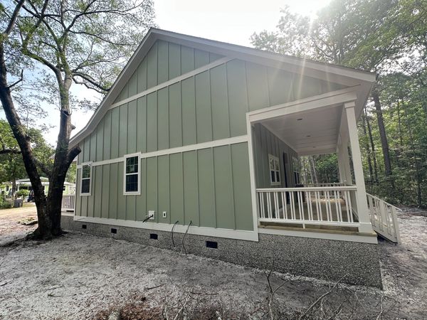 Residential construction with new James Hardie fiber cement siding installation