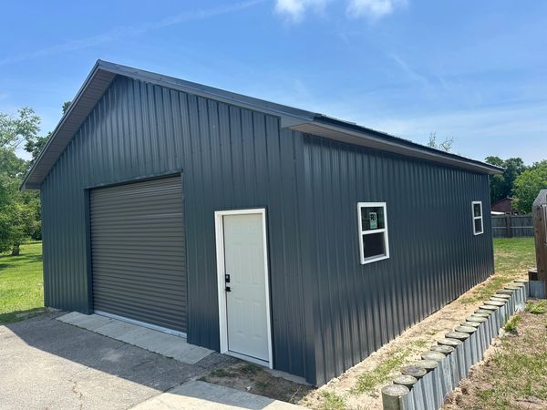 Shed up-fit with new siding and new windows