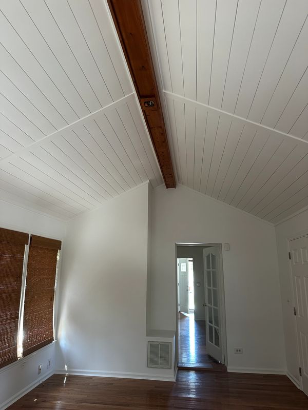Shiplap ceiling with fresh paint