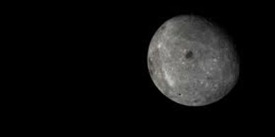 Gray, cratered celestial body against black space.
