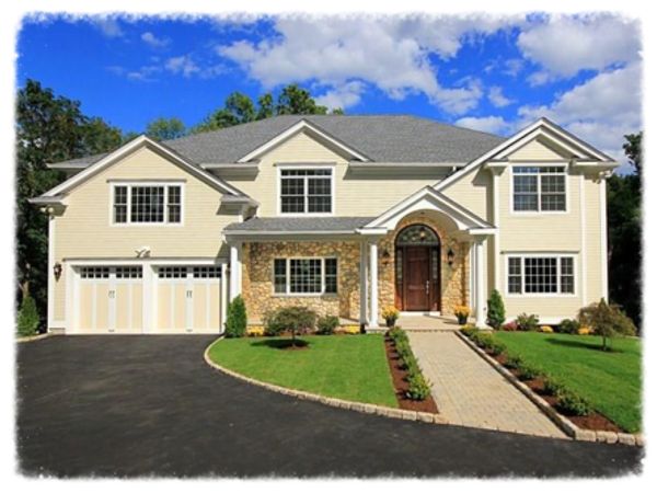 Large two-story suburban house with stone accents.