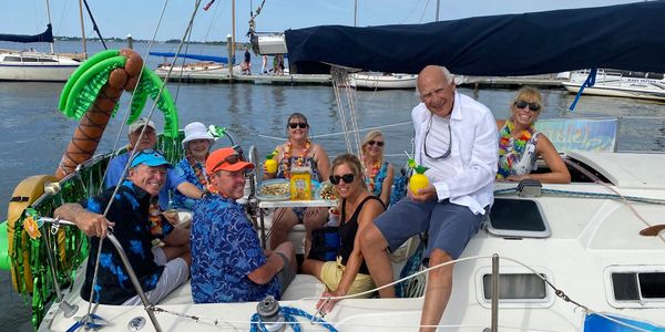 Group of people enjoying in the sailing boat